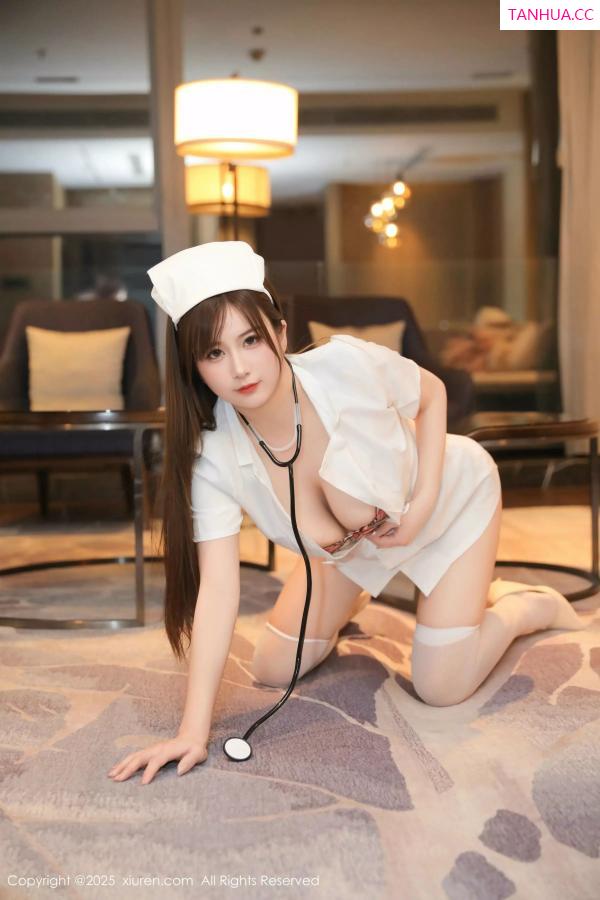   [XiuRen]高清写真图 2025.03.31 No.10089 小肉肉咪 白色护士第16张图片